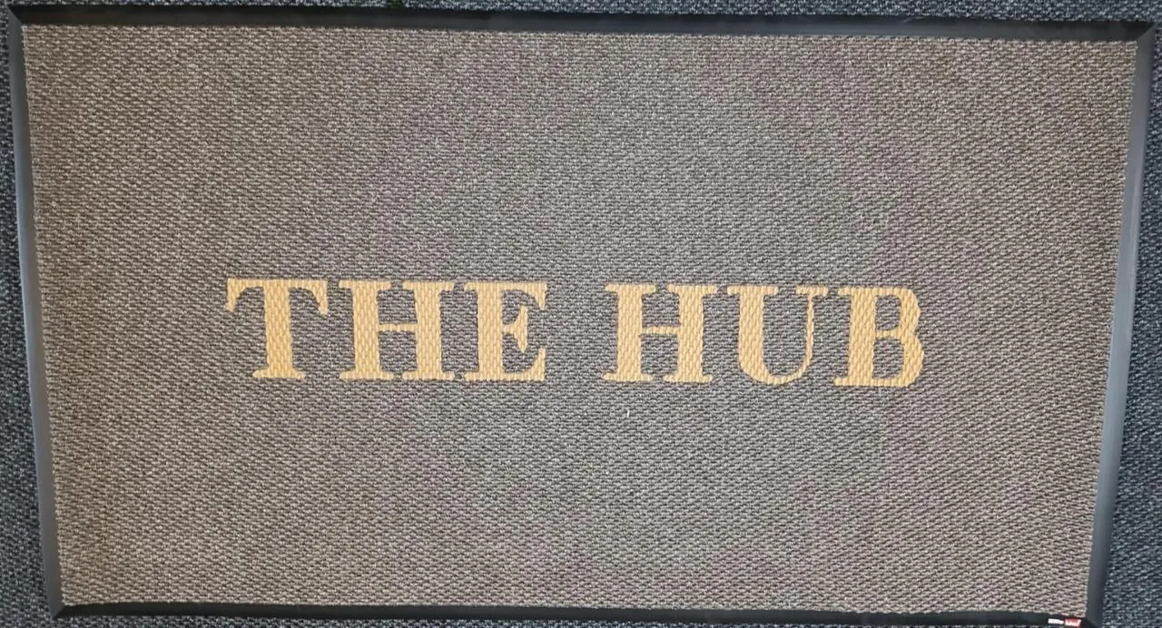 Tapete de alfombra de The Hub